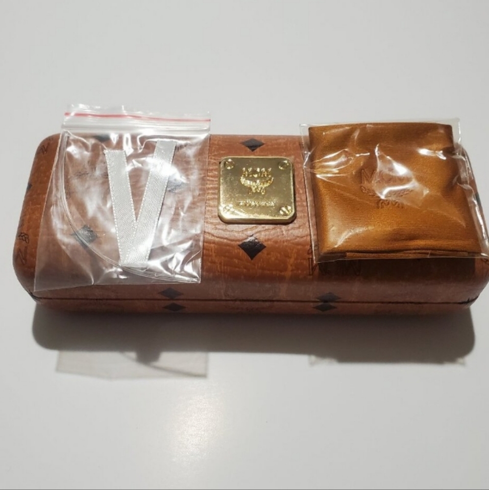 MCM AUTHENTIC WINE COLORED GLASSES NWT / CASE AND INCLUSION - Picture 4 of 5